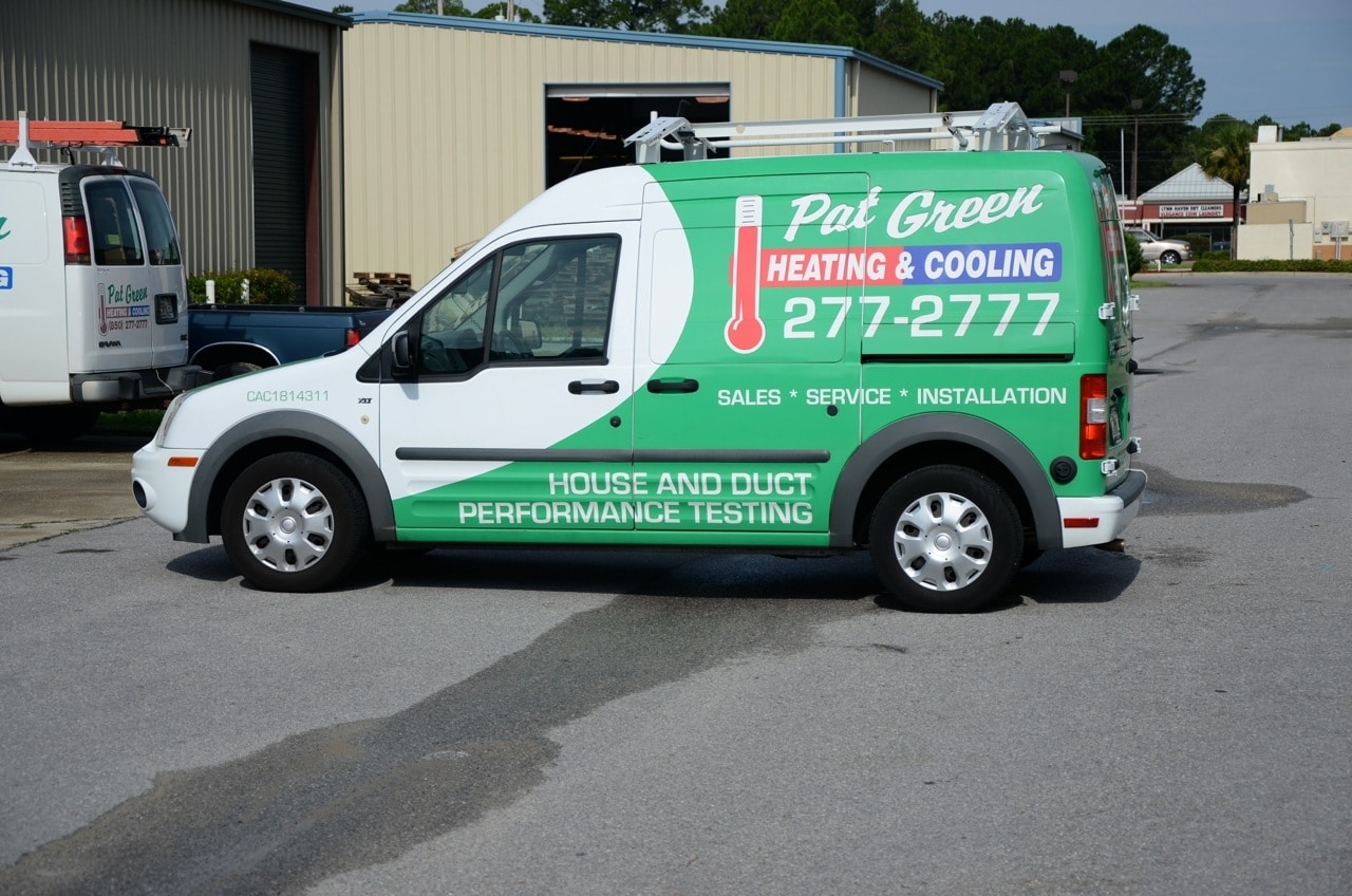 Pat Green Heating & Cooling work van parked outside the Panama City warehouse